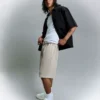 Bermudas com corte largo e estampado – Calções e bermudas – Homem