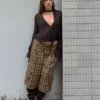 Blusa de manga comprida com lenço cruzado