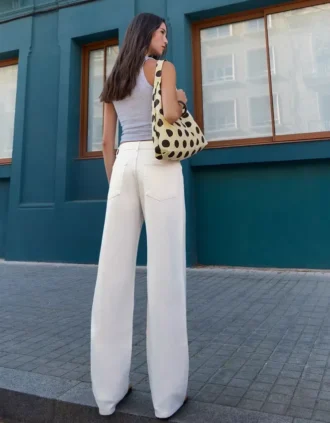 Calças de Jeans de cintura alta, corte Straight e perna Wide Leg – Calças – Mulher