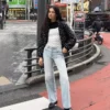 Calças de Jeans de cintura alta, perna Wide Leg e corte Straight