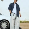 Calças de jeans plissadas de corte largo – Jeans – Homem