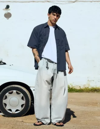 Calças de jeans plissadas de corte largo – Jeans – Homem