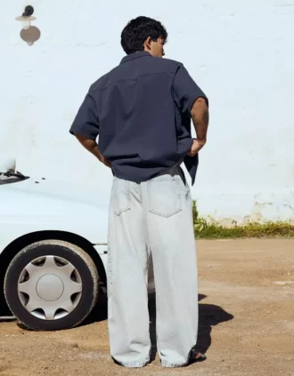 Calças de jeans plissadas de corte largo – Jeans – Homem