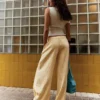 Calças Listradas Fluidas – Mulher