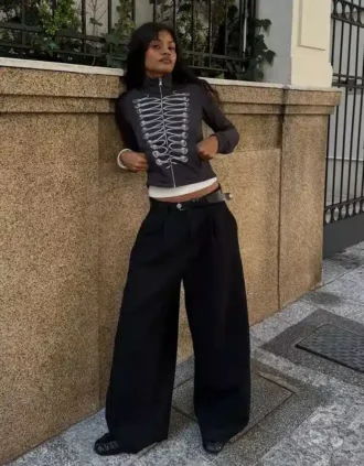 Calças volumosas de tecido duplo