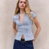 Camisa de manga curta com fecho – Camisas e blusas