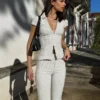 Camisa de manga curta com fecho – Camisas e blusas