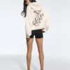 Camisola com capuz estampada