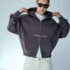 Camisola curta com fecho e corte largo com estampado – Sweatshirts e hoodies
