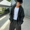 Camisola Fit curta com fecho e corte largo