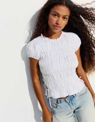Camisola franzida com laços laterais