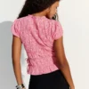 Camisola franzida com laços laterais