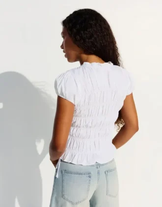 Camisola franzida com laços laterais