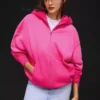 Casaco com capuz oversize com fecho