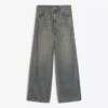 Jeans boyfriend de cintura baixa com tachas
