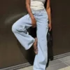 Jeans de cintura alta e perna Wide Leg com cintura cruzada