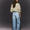 Jeans de cintura alta, perna Wide Leg e reta com bainhas viradas para cima – Calças