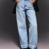 Jeans de cintura alta, perna Wide Leg e reta com bainhas viradas para cima – Calças
