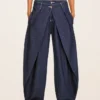 Jeans de cintura baixa com corte balão torcido – Calças