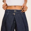 Jeans de cintura baixa com corte balão torcido – Calças