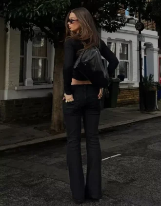 Jeans de cintura baixa com corte bootcut e abas