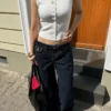 Jeans de cintura baixa e corte largo