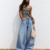 Jeans de cintura baixa e perna Wide Leg com botões à frente – Calças