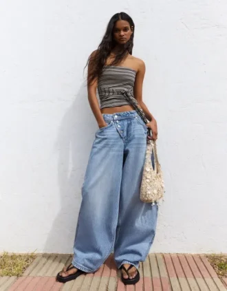 Jeans de cintura baixa e perna Wide Leg com botões à frente – Calças
