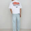 Jeans largos com remendo