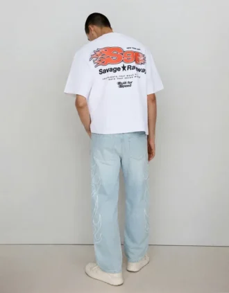 Jeans largos com remendo
