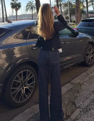 Jeans sem costuras, de cintura alta e perna Wide Leg, com bolsos – Calças – Mulher