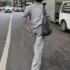 Jeans super largos com bordado