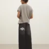 Jeans super largos com bordados