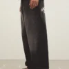 Jeans super largos com bordados