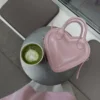 Mini-bolsa com coração Mini-bolsa com coração