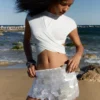 Mini-saia maxi com lantejoulas