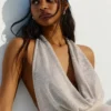 Mini-vestido com laces e lantejoulas